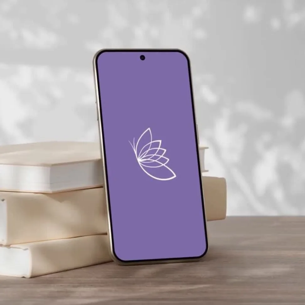 Butterfly and water lily logo used as an app icon on a smartphone