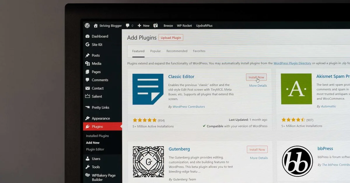 WordPress dashboard on a monitor, open on the plugins screen